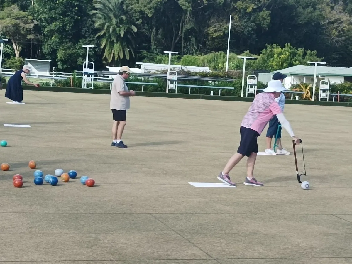 Player using a bowling arm